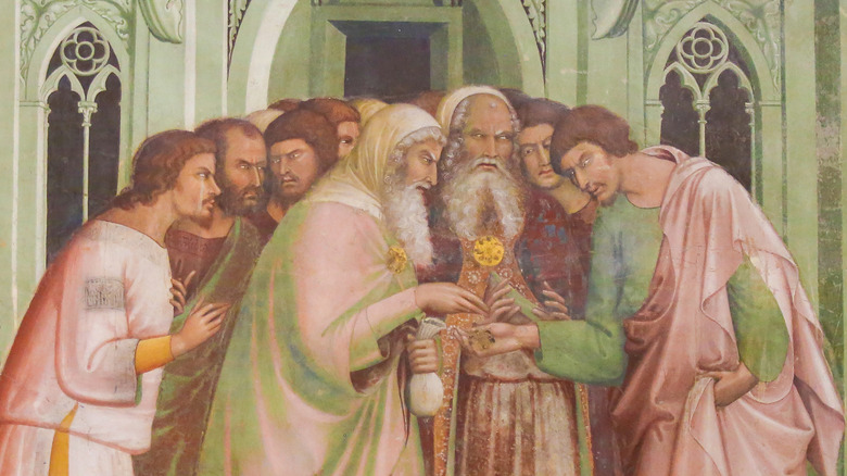 Judas receiving 30 pieces of silver