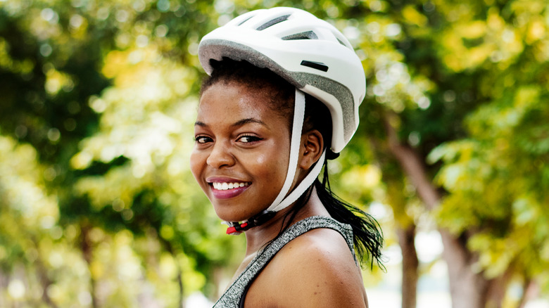 Cyclist wearing helmet