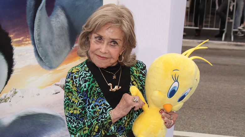 Foray holds a Tweety Bird plush