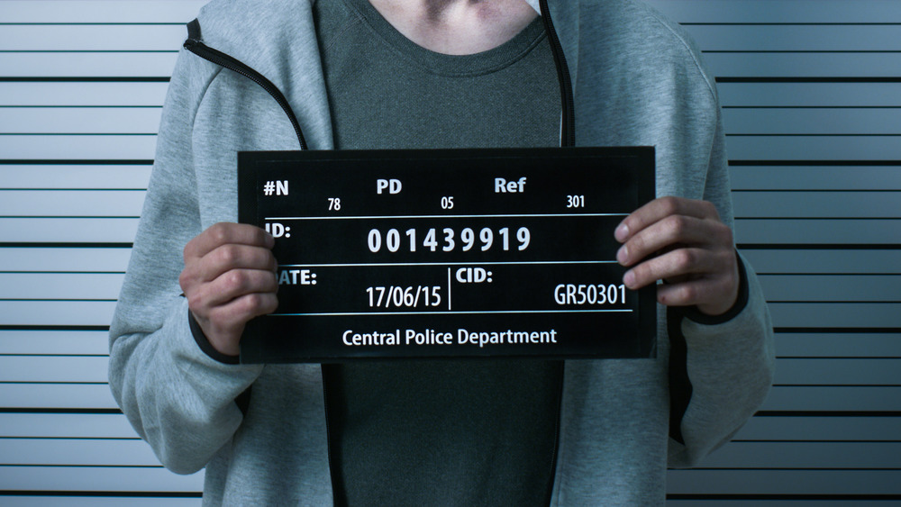 A criminal posing for a mugshot