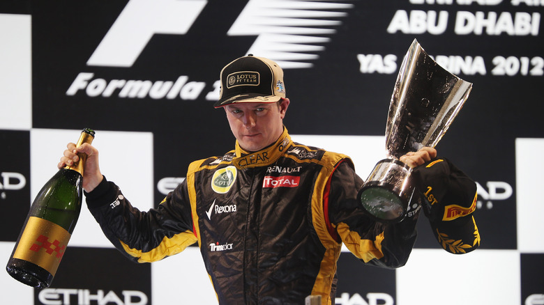 Kimi Raikkonen on podium black suit