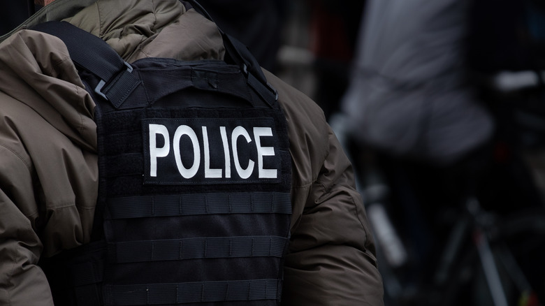 Police officer wearing bulletproof vest