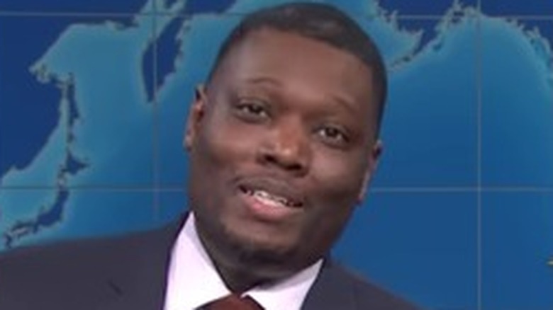 Michael Che doing Weekend Update on SNL