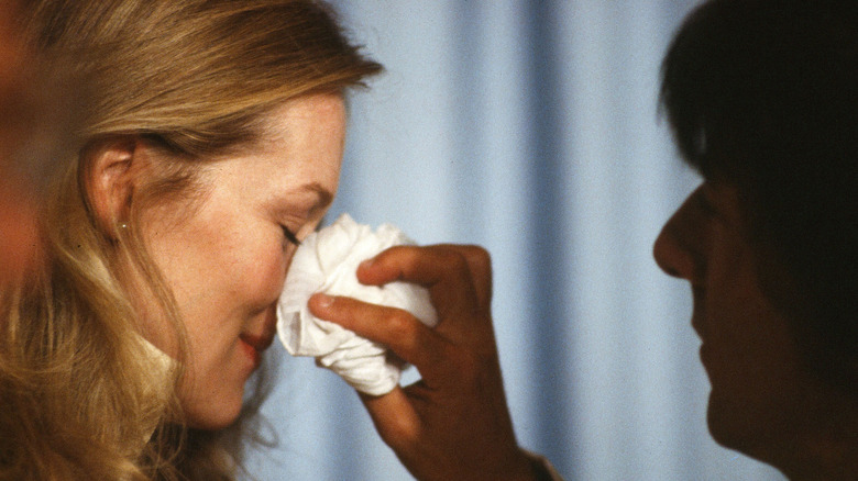 Dustin hoffman wiping tear from Meryl Streep