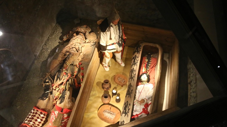 museum recreation of ukok woman burial chamber