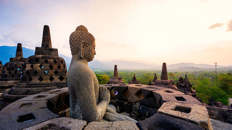 Buddha in stuppa at Borobudor