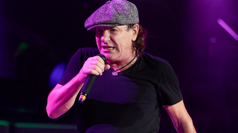 Brian Johnson singing onstage