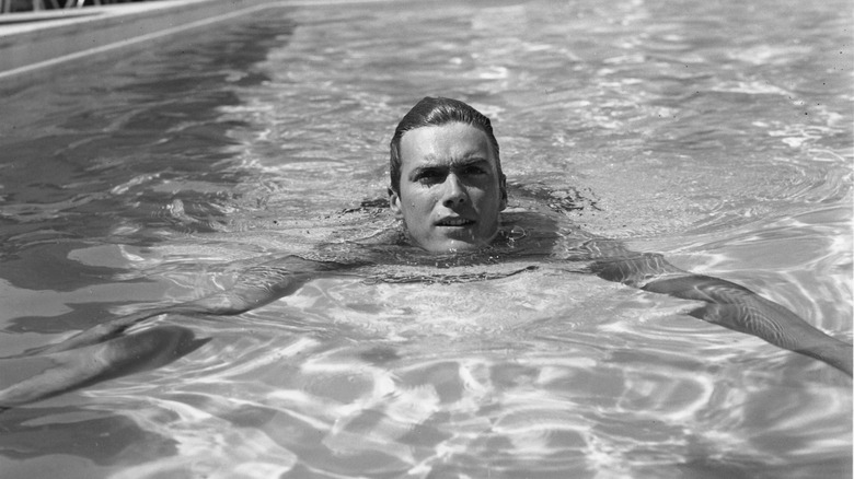 Clint Eastwood in pool 1950s