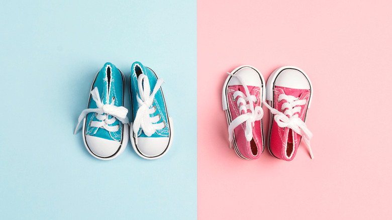 pink and blue sneakers for a baby human