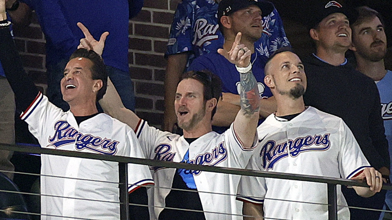 Stapp and members of Creed attending baseball game together in 2023