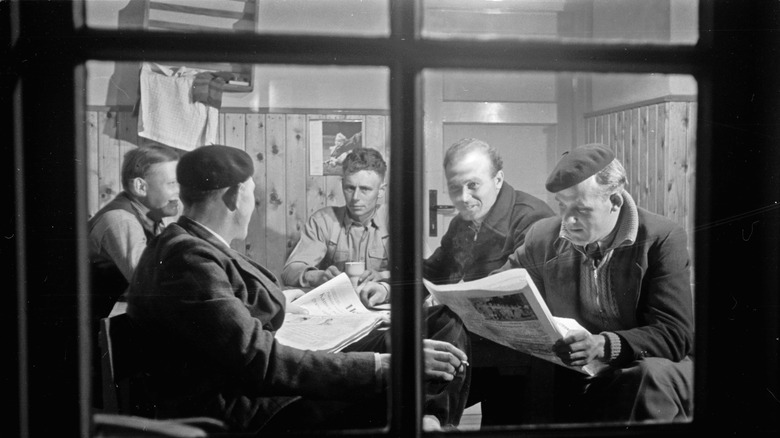 people reading newspapers 1950s