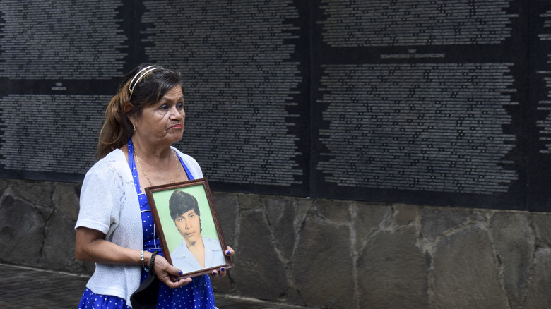 Salvadoran woman with missing poster