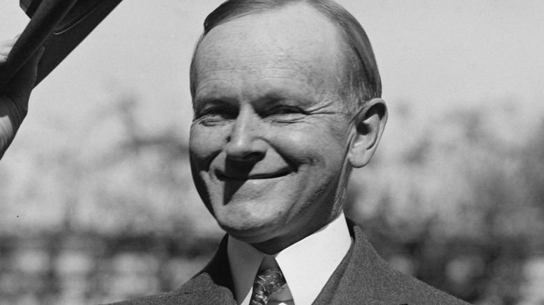 calvin coolidge doffing hat