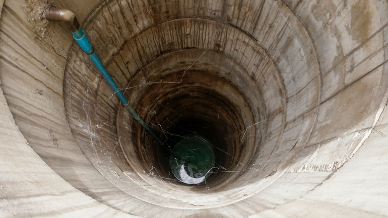 View down concrete well