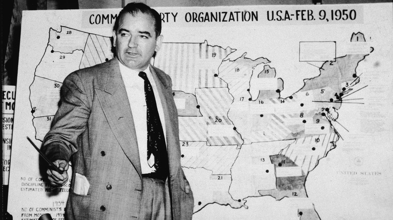 Joseph McCarthy with communism map