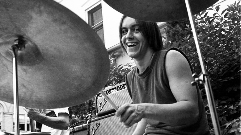 Iggy Pop playing the drums