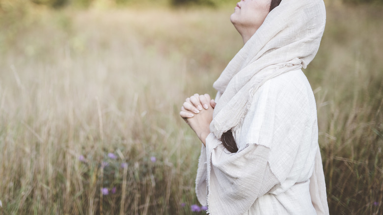 Woman in white robe