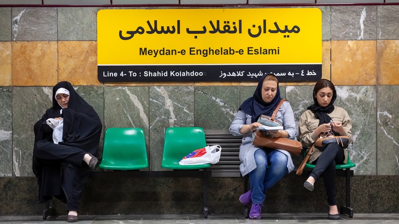 Iranian women waiting for train