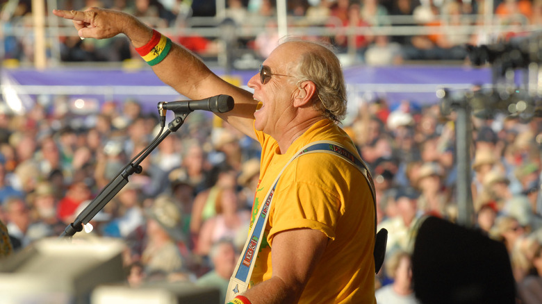 Jimmy Buffett performing New Orleans pointing