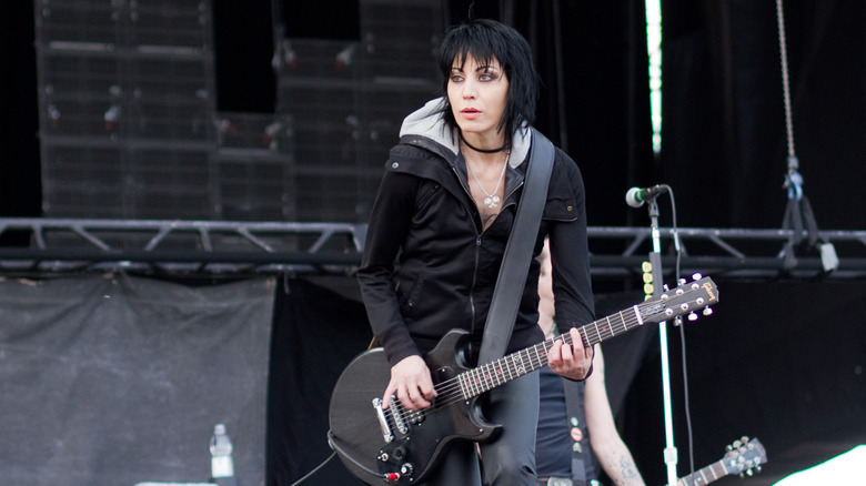 Joan Jett playing guitar