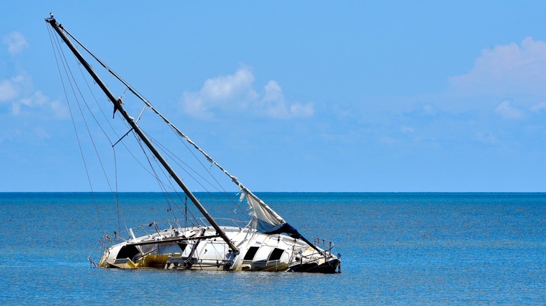 Listing sailboat at sea