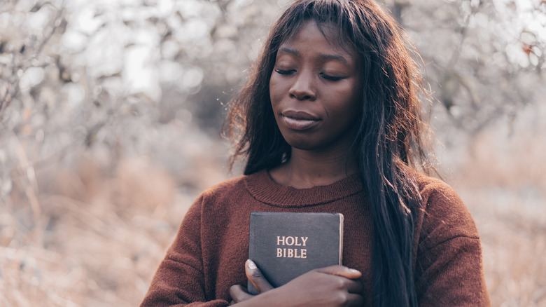 Holding a Bible