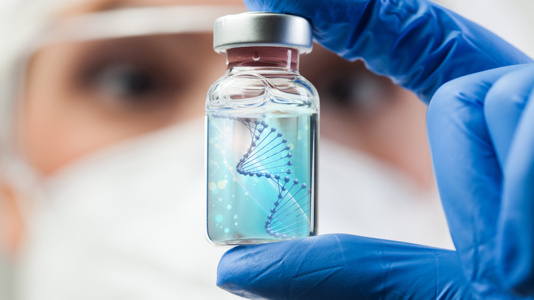 scientist holding dna sample