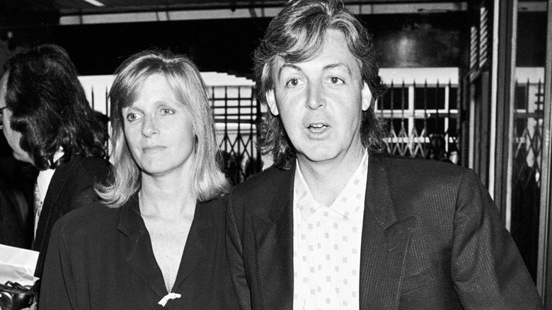 Paul and Linda McCartney walking