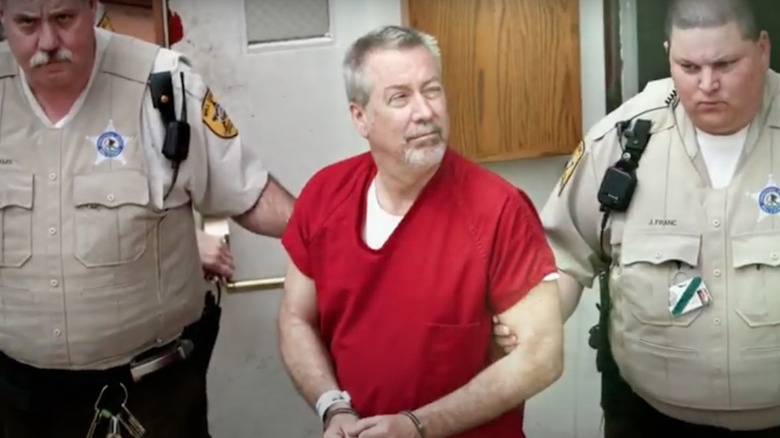 Drew Peterson with officers