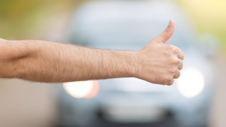 man hitchhiking