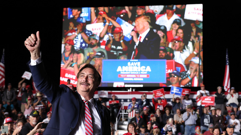 Mike Lindell holding arm in the air