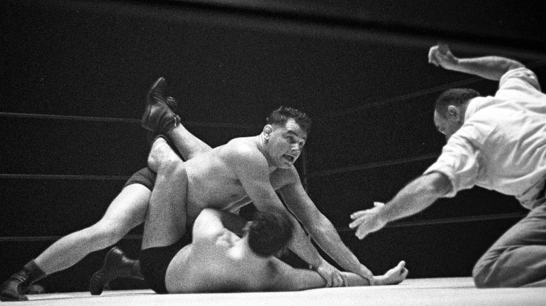Dean Detton wrestling an opponent at the Olympic Auditorium