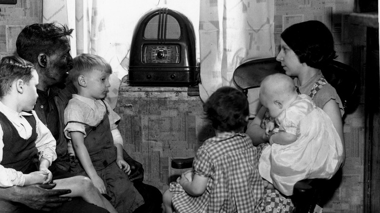 family listening to radio