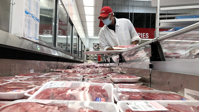 worker and meat butcher packages