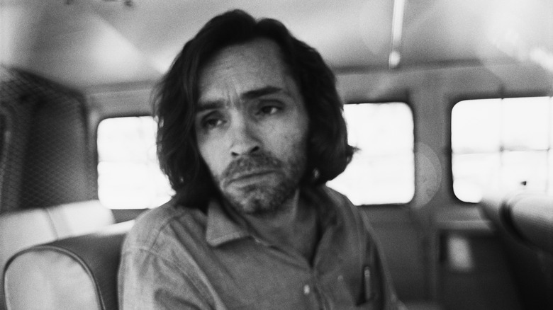 Charles Manson riding car