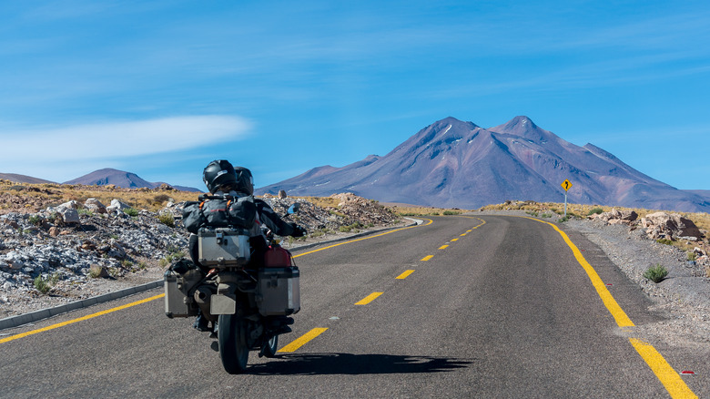 Couple on a motorcycle riding on the highway