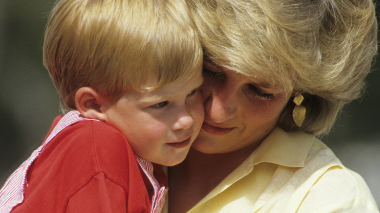 Princess Diana holding Prince Harry