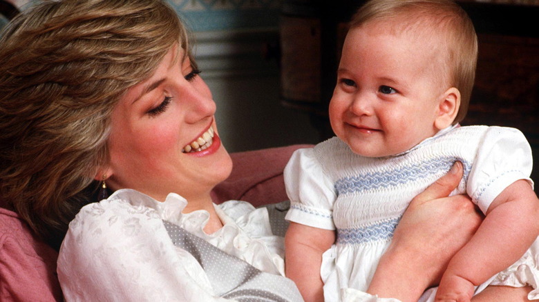 Princess Diana holding William as baby