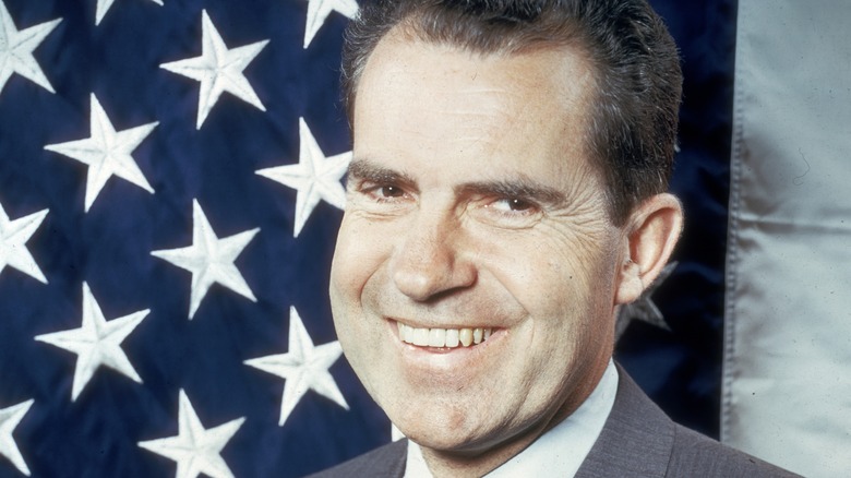 Nixon smiling