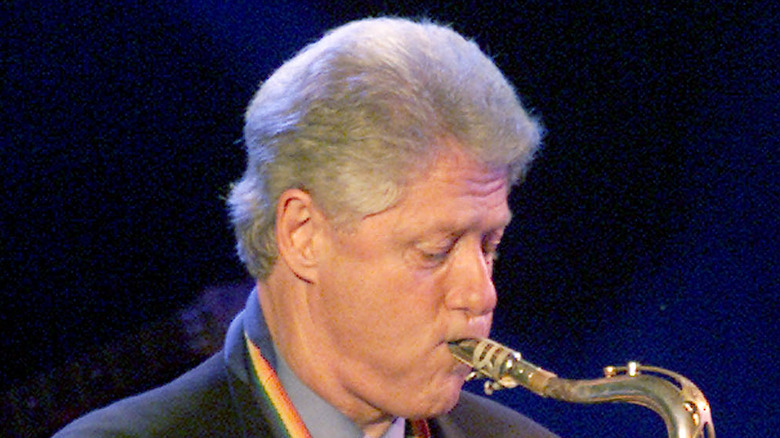 Bill Clinton playing saxophone