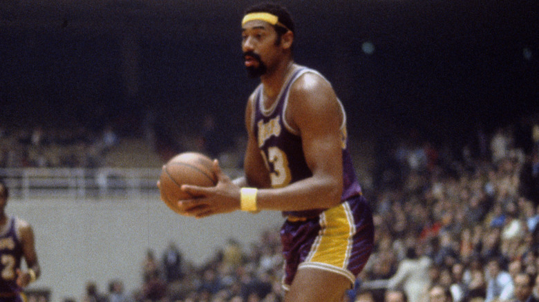 Wilt Chamberlain prepares to pass