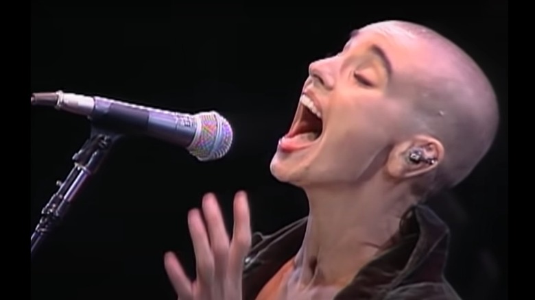 Sinead O'Connor performing microphone