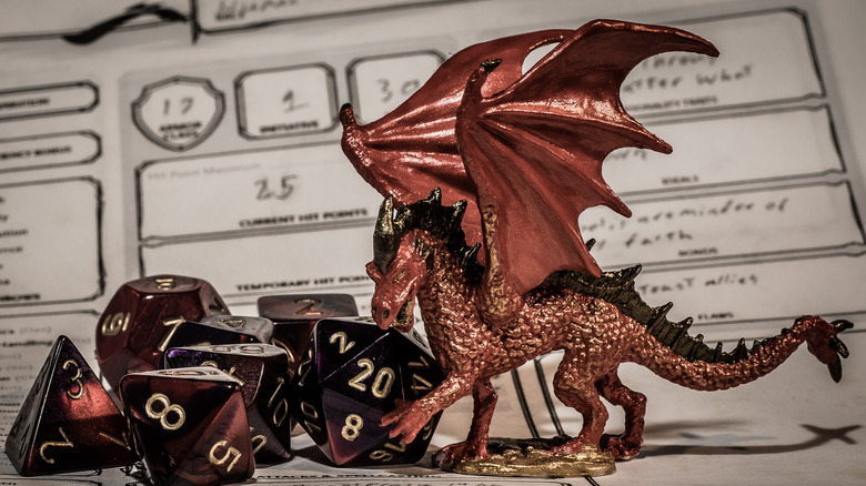 D&D dice and figurine