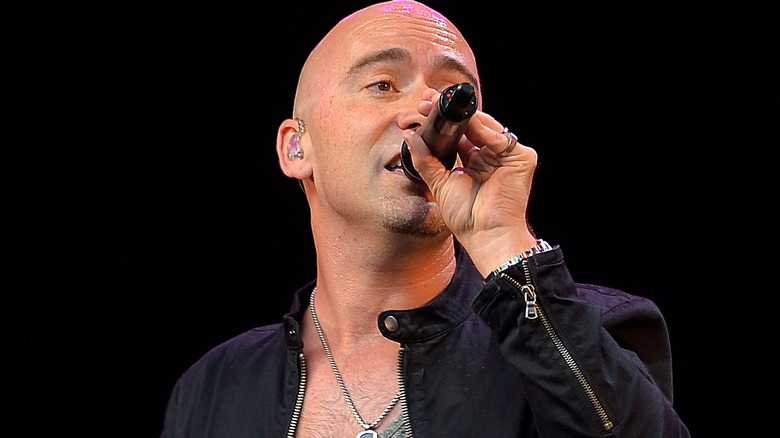 Ed Kowalczyk necklace holding mic singing