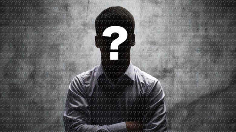 Silhouette of a man with a question mark on his face