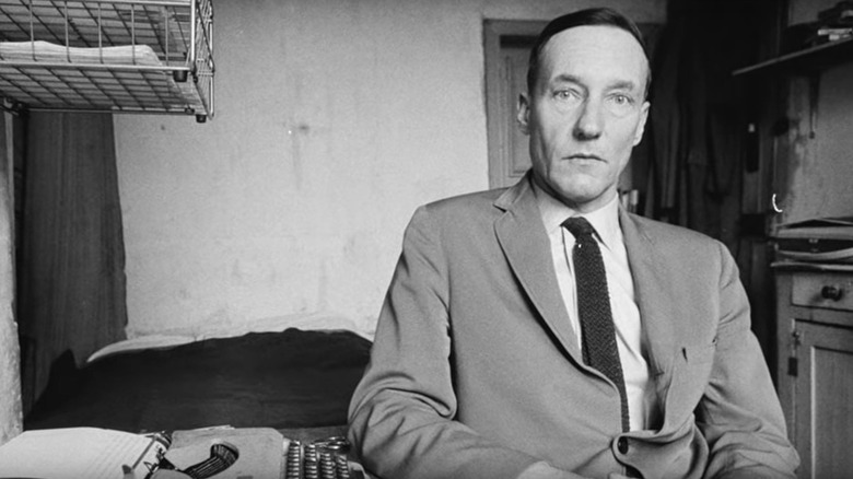 William s. Burroughs near a typewriter