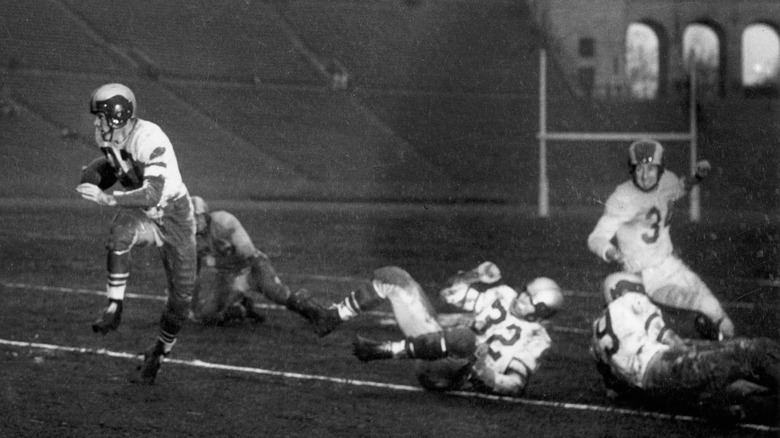 Philadelphia Eagles runner on a carry in a 14-0 win over the Los Angeles Rams in a League Championship game on December 18, 1949