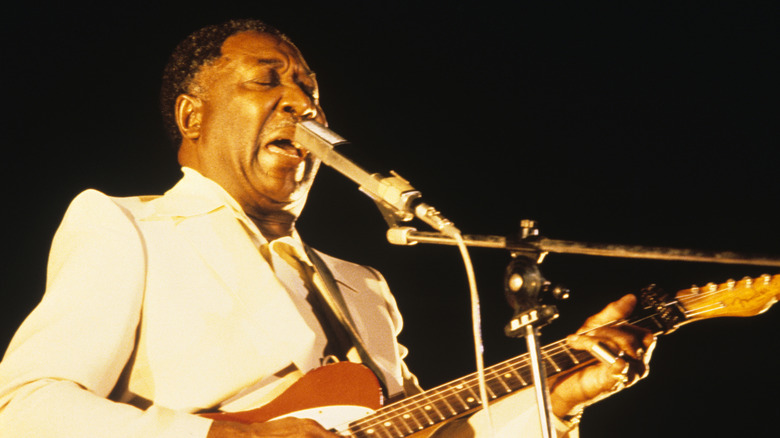 Muddy Waters playing the guitar