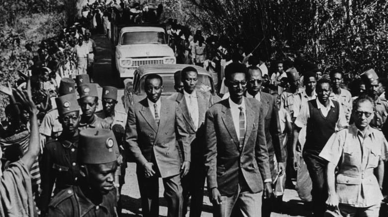 King of Rwanda walking through crowd