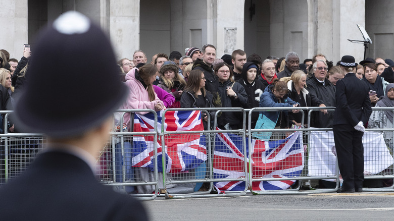 police guarding barricade at funeral of Queen Elizabeth 